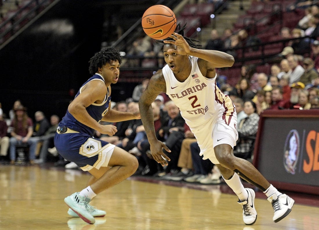 Jan 3, 2024; Tallahassee, Florida, USA; Florida State Seminoles forward Jamir Watkins (2) dribbles towards the net during the first half against the Georgia Tech Yellow Jackets at Donald L. Tucker Center. Mandatory Credit: Melina Myers-USA TODAY Sports