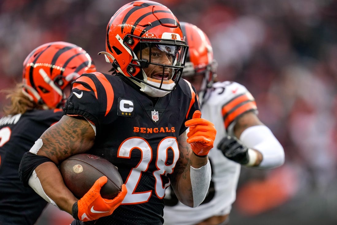 Cincinnati Bengals running back Joe Mixon (28) breaks away on a deep run in the first quarter of the NFL Week 18 game between the Cincinnati Bengals and the Cleveland Browns at Paycor Stadium in downtown Cincinnati on Sunday, Jan. 7, 2024.