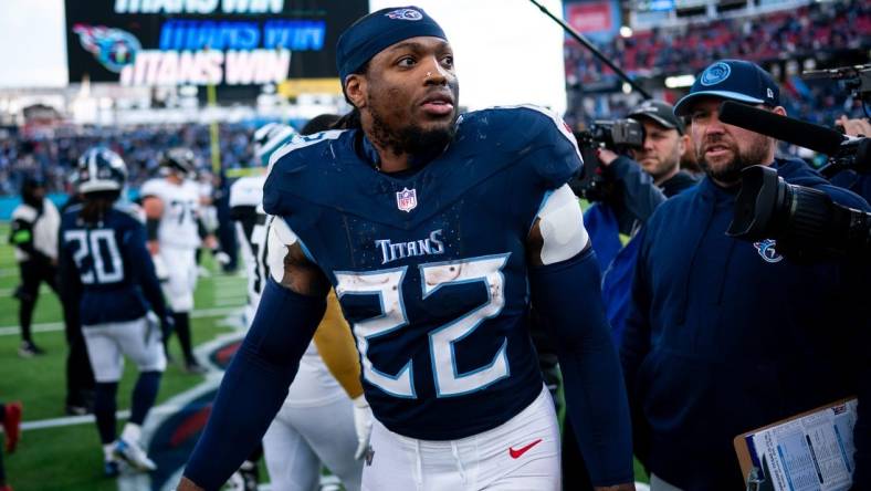 Tennessee Titans running back Derrick Henry (22) exits the field after defeating Jacksonville Jaguars 28-20 at Nissan Stadium in Nashville, Tenn., Sunday, Jan. 7, 2024.