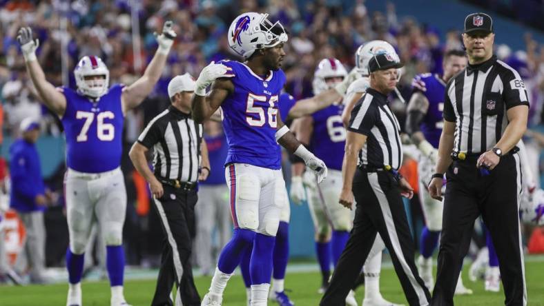 Jan 7, 2024; Miami Gardens, Florida, USA; Buffalo Bills defensive end Leonard Floyd (56) celebrates after winning the game against the Miami Dolphins at Hard Rock Stadium. Mandatory Credit: Sam Navarro-USA TODAY Sports