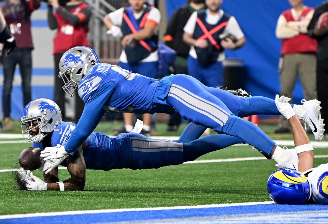 Jan 14, 2024; Detroit, Michigan, USA; Detroit Lions cornerback Cameron Sutton (1) and linebacker Jalen Reeves-Maybin (42) break up a pass during the first half of a 2024 NFC wild card game against the Los Angeles Rams at Ford Field. Mandatory Credit: Lon Horwedel-USA TODAY Sports