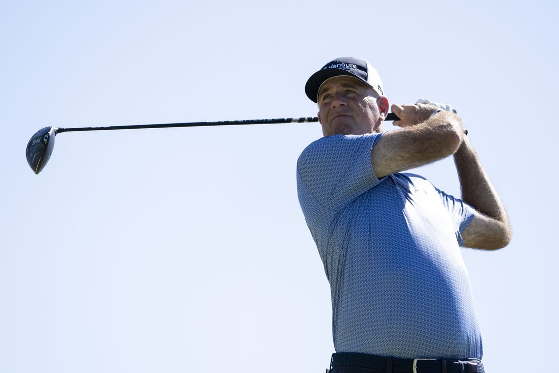 January 14, 2024; Honolulu, Hawaii, USA; Stewart Cink hits his tee shot on the 14th hole during the final round of the Sony Open in Hawaii golf tournament at Waialae Country Club. Mandatory Credit: Kyle Terada-USA TODAY Sports