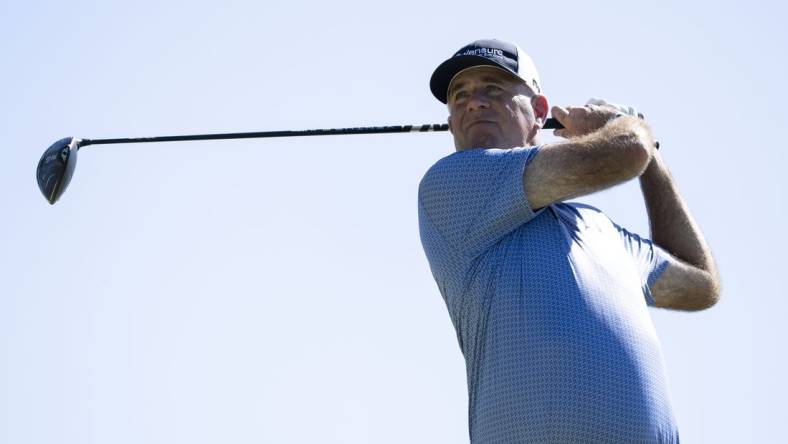 January 14, 2024; Honolulu, Hawaii, USA; Stewart Cink hits his tee shot on the 14th hole during the final round of the Sony Open in Hawaii golf tournament at Waialae Country Club. Mandatory Credit: Kyle Terada-USA TODAY Sports