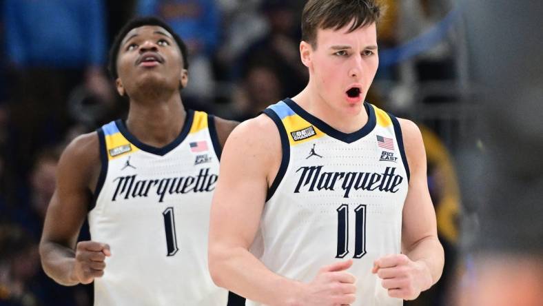 Jan 15, 2024; Milwaukee, Wisconsin, USA; Marquette Golden Eagles guard Tyler Kolek (11) reacts after scoring a basket in the second half against the Villanova Wildcats at Fiserv Forum. Mandatory Credit: Benny Sieu-USA TODAY Sports