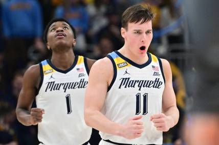 Jan 15, 2024; Milwaukee, Wisconsin, USA; Marquette Golden Eagles guard Tyler Kolek (11) reacts after scoring a basket in the second half against the Villanova Wildcats at Fiserv Forum. Mandatory Credit: Benny Sieu-USA TODAY Sports
