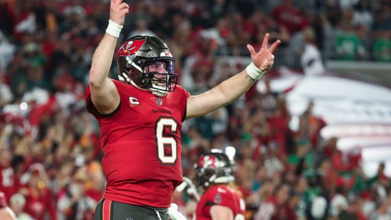 Jan 15, 2024; Tampa, Florida, USA; Tampa Bay Buccaneers quarterback Baker Mayfield (6) celebrates a touchdown against the Philadelphia Eagles during the first half of a 2024 NFC wild card game at Raymond James Stadium. Mandatory Credit: Kim Klement Neitzel-USA TODAY Sports