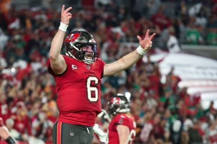 Jan 15, 2024; Tampa, Florida, USA; Tampa Bay Buccaneers quarterback Baker Mayfield (6) celebrates a touchdown against the Philadelphia Eagles during the first half of a 2024 NFC wild card game at Raymond James Stadium. Mandatory Credit: Kim Klement Neitzel-USA TODAY Sports