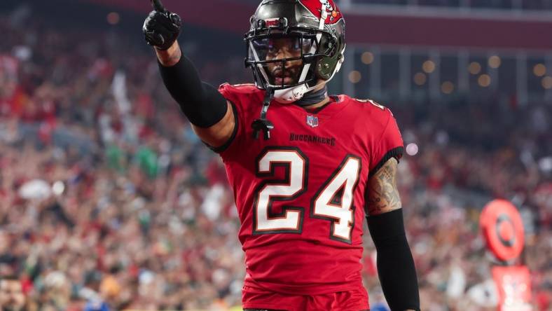 Jan 15, 2024; Tampa, Florida, USA; Tampa Bay Buccaneers cornerback Carlton Davis III (24) gestures after a play against the Philadelphia Eagles during the second half of a 2024 NFC wild card game at Raymond James Stadium. Mandatory Credit: Kim Klement Neitzel-USA TODAY Sports