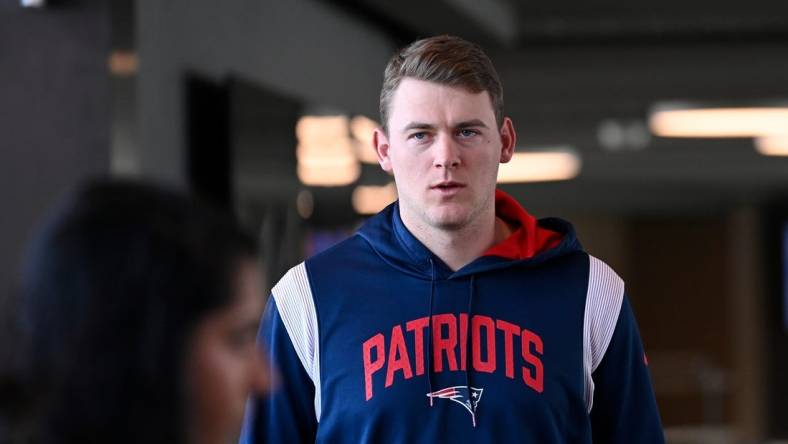 Jan 17, 2024; Foxborough, MA, USA; New England Patriots quarterback Mac Jones (10) arrives to a press conference held at Gillette Stadium to announce the team's hiring of new head coach Jerod Mayo (not pictured). Mandatory Credit: Eric Canha-USA TODAY Sports