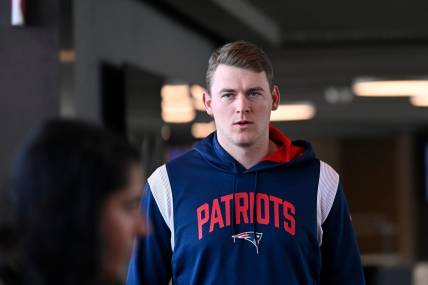 Jan 17, 2024; Foxborough, MA, USA; New England Patriots quarterback Mac Jones (10) arrives to a press conference held at Gillette Stadium to announce the team's hiring of new head coach Jerod Mayo (not pictured). Mandatory Credit: Eric Canha-USA TODAY Sports