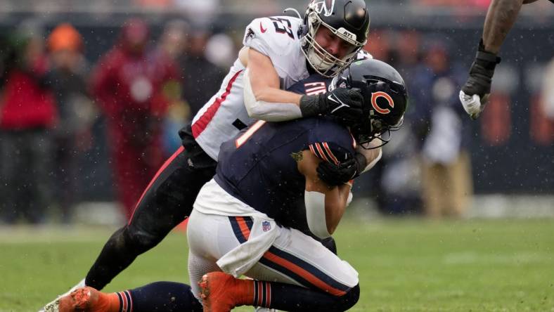 Dec 31, 2023; Chicago, Illinois, USA;  Atlanta Falcons linebacker Nate Landman (53) makes a tackle against the Chicago Bears at Soldier Field. Mandatory Credit: Jamie Sabau-USA TODAY Sports