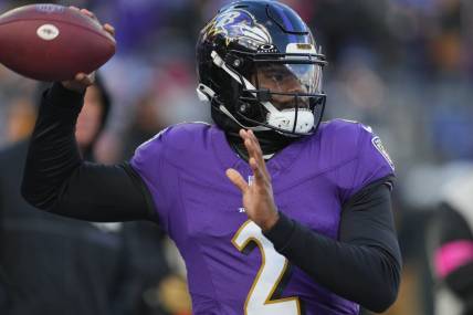 Jan 20, 2024; Baltimore, MD, USA; Baltimore Ravens quarterback Tyler Huntley (2) warms up before a 2024 AFC divisional round game against the Houston Texans at M&T Bank Stadium. Mandatory Credit: Mitch Stringer-USA TODAY Sports