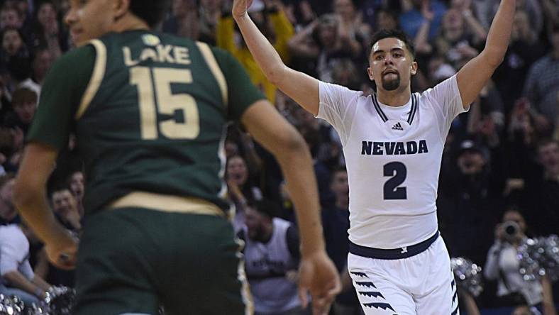 Nevada's Jarod Lucas celebrates after hitting a three point shot while taking on Colorado State at Lawlor Events Center in Reno on Jan. 24, 2024.