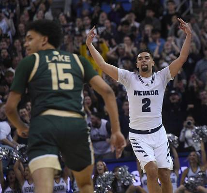 Nevada's Jarod Lucas celebrates after hitting a three point shot while taking on Colorado State at Lawlor Events Center in Reno on Jan. 24, 2024.
