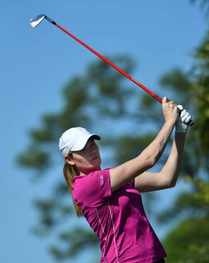 Maude-Aimee Leblanc, from Sherbrooke, Quebec, hits her tee shot on the par three, 11th hole Thursday, Jan. 25, 2024 at the LPGA Drive On Championship at the Bradenton Country Club in Bradenton, Florida.