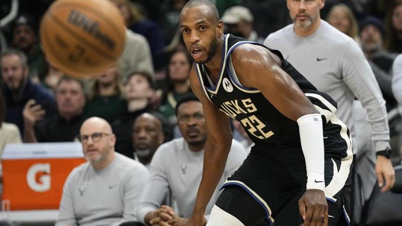 Jan 26, 2024; Milwaukee, Wisconsin, USA;  Milwaukee Bucks forward Khris Middleton (22) looks at the ball during the second quarter against the Cleveland Cavaliers at Fiserv Forum. Mandatory Credit: Jeff Hanisch-USA TODAY Sports