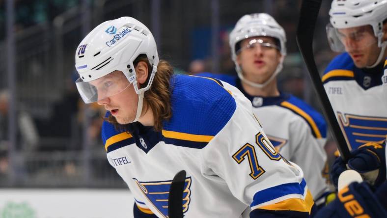 Jan 26, 2024; Seattle, Washington, USA; St. Louis Blues center Oskar Sundqvist (70) after scoring a goal against the Seattle Kraken during the first period at Climate Pledge Arena. Mandatory Credit: Steven Bisig-USA TODAY Sports