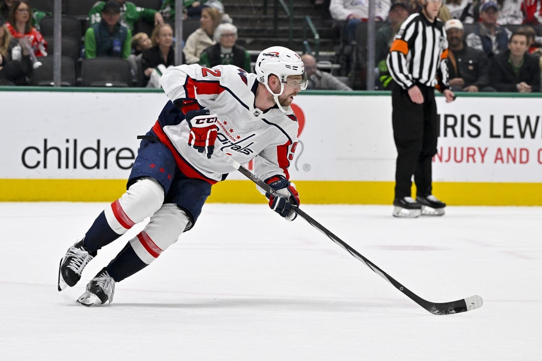 Jan 27, 2024; Dallas, Texas, USA; Washington Capitals center Evgeny Kuznetsov (92) skates against the Dallas Stars during the second period at the American Airlines Center. Mandatory Credit: Jerome Miron-USA TODAY Sports