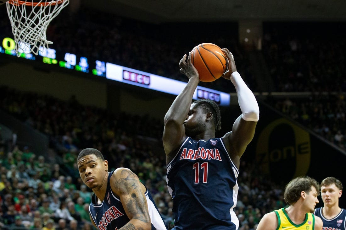 Arizona center Oumar Ballo snags a rebound as the Oregon Ducks host the Arizona Wildcats Saturday, Jan. 27, 2024 at Matthew Knight Arena in Eugene, Ore.