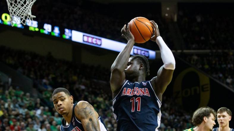 Arizona center Oumar Ballo snags a rebound as the Oregon Ducks host the Arizona Wildcats Saturday, Jan. 27, 2024 at Matthew Knight Arena in Eugene, Ore.