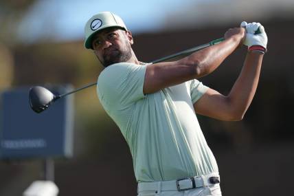 Jan 27, 2024; San Diego, California, USA; Tony Finau hits his tee shot on the fourteenth hole during the final round of the Farmers Insurance Open golf tournament at Torrey Pines Municipal Golf Course - South Course. Mandatory Credit: Ray Acevedo-USA TODAY Sports
