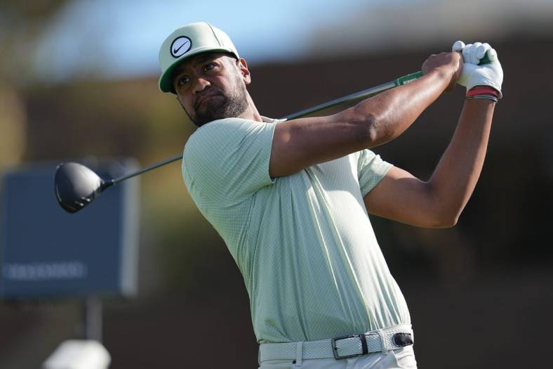 Jan 27, 2024; San Diego, California, USA; Tony Finau hits his tee shot on the fourteenth hole during the final round of the Farmers Insurance Open golf tournament at Torrey Pines Municipal Golf Course - South Course. Mandatory Credit: Ray Acevedo-USA TODAY Sports
