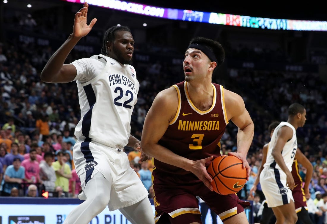 Jan 27, 2024; University Park, Pennsylvania, USA; Minnesota Golden Gophers forward Dawson Garcia (3) looks to drive the ball to the basket as Penn State Nittany Lions forward Qudus Wahab (22) defends during the second half at Bryce Jordan Center. Minnesota defeated Penn State 83-74. Mandatory Credit: Matthew O'Haren-USA TODAY Sports