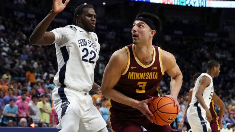 Jan 27, 2024; University Park, Pennsylvania, USA; Minnesota Golden Gophers forward Dawson Garcia (3) looks to drive the ball to the basket as Penn State Nittany Lions forward Qudus Wahab (22) defends during the second half at Bryce Jordan Center. Minnesota defeated Penn State 83-74. Mandatory Credit: Matthew O'Haren-USA TODAY Sports