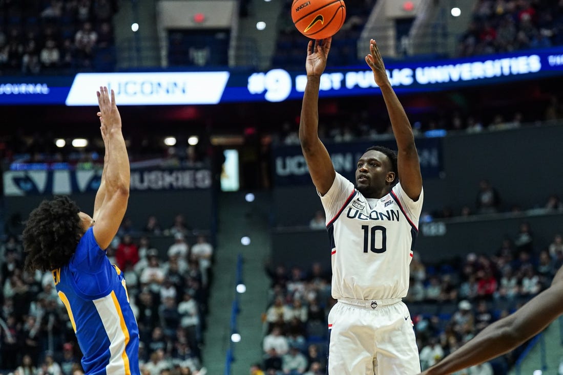 Jan 28, 2024; Hartford, Connecticut, USA; UConn Huskies guard Hassan Diarra (10) shoots for three points against the Xavier Musketeers in the second half at XL Center. Mandatory Credit: David Butler II-USA TODAY Sports