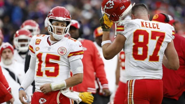 Jan 28, 2024; Baltimore, Maryland, USA; Kansas City Chiefs quarterback Patrick Mahomes (15) celebrates with Chiefs tight end Travis Kelce (87) after a touchdown against the Baltimore Ravens in the AFC Championship football game at M&T Bank Stadium. Mandatory Credit: Geoff Burke-USA TODAY Sports