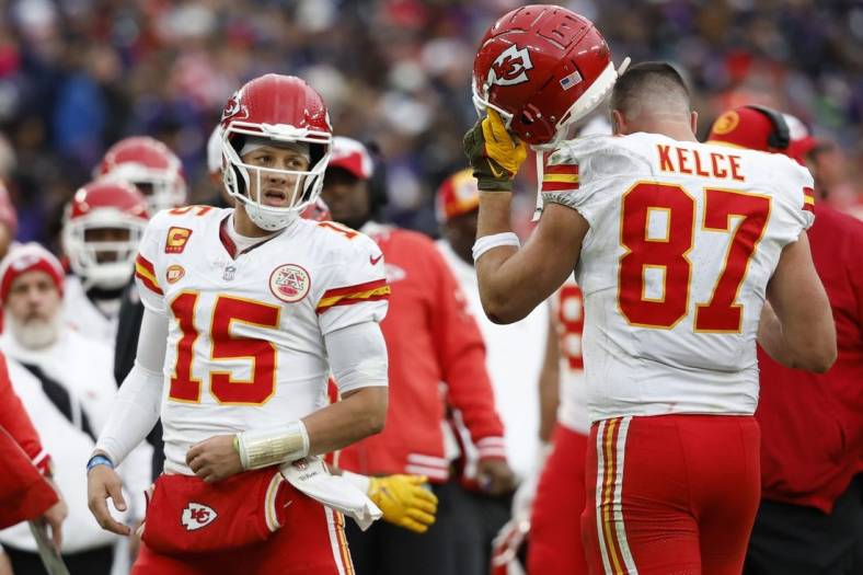 Jan 28, 2024; Baltimore, Maryland, USA; Kansas City Chiefs quarterback Patrick Mahomes (15) celebrates with Chiefs tight end Travis Kelce (87) after a touchdown against the Baltimore Ravens in the AFC Championship football game at M&T Bank Stadium. Mandatory Credit: Geoff Burke-USA TODAY Sports