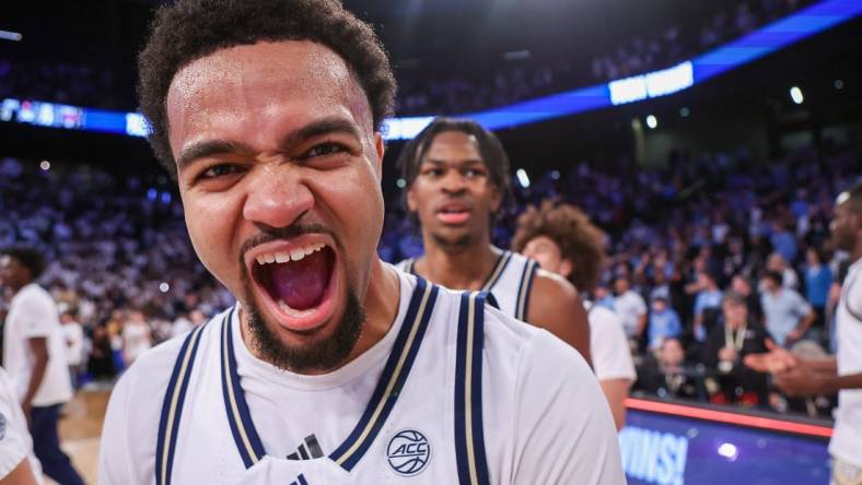 Jan 30, 2024; Atlanta, Georgia, USA; Georgia Tech Yellow Jackets guard Kyle Sturdivant (1) celebrates after a victory against the North Carolina Tar Heels at McCamish Pavilion. Mandatory Credit: Brett Davis-USA TODAY Sports