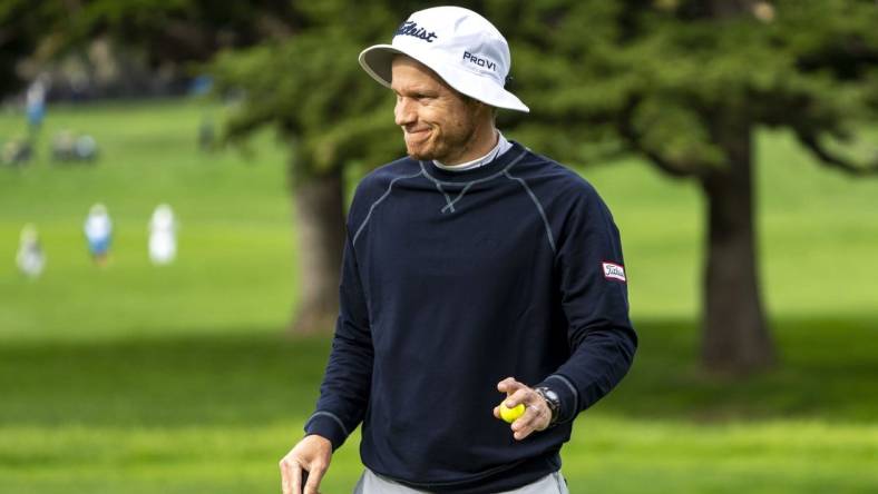 February 3, 2024; Pebble Beach, California, USA; Peter Malnati acknowledges the crowd after making his putt on the second hole during the third round of the AT&T Pebble Beach Pro-Am golf tournament at Pebble Beach Golf Links. Mandatory Credit: Kyle Terada-USA TODAY Sports