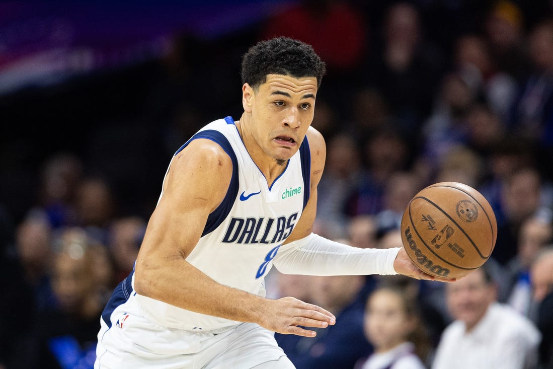 Feb 5, 2024; Philadelphia, Pennsylvania, USA; Dallas Mavericks guard Josh Green (8) dribbles the ball Philadelphia 76ers at Wells Fargo Center. Mandatory Credit: Bill Streicher-USA TODAY Sports