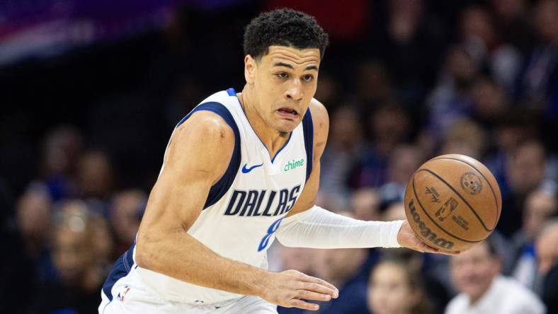 Feb 5, 2024; Philadelphia, Pennsylvania, USA; Dallas Mavericks guard Josh Green (8) dribbles the ball Philadelphia 76ers at Wells Fargo Center. Mandatory Credit: Bill Streicher-USA TODAY Sports