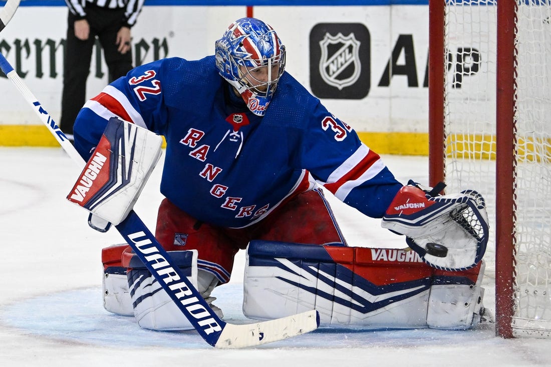 Feb 5, 2024; New York, New York, USA;  New York Rangers goaltender Jonathan Quick (32) makes a save against the Colorado Avalanche during the third period at Madison Square Garden. Mandatory Credit: Dennis Schneidler-USA TODAY Sports