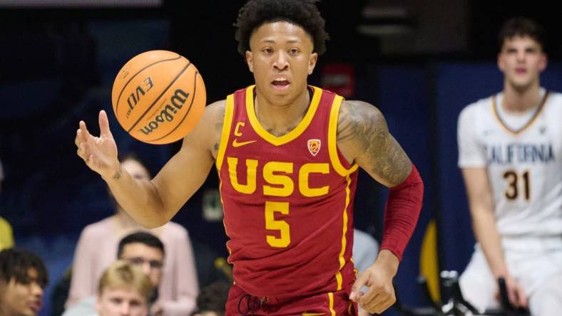 Feb 7, 2024; Berkeley, California, USA; USC Trojans guard Boogie Ellis (5) dribbles the ball against the California Golden Bears during the second half at Haas Pavilion. Mandatory Credit: Robert Edwards-USA TODAY Sports