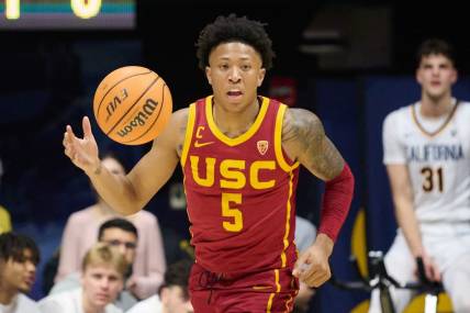 Feb 7, 2024; Berkeley, California, USA; USC Trojans guard Boogie Ellis (5) dribbles the ball against the California Golden Bears during the second half at Haas Pavilion. Mandatory Credit: Robert Edwards-USA TODAY Sports