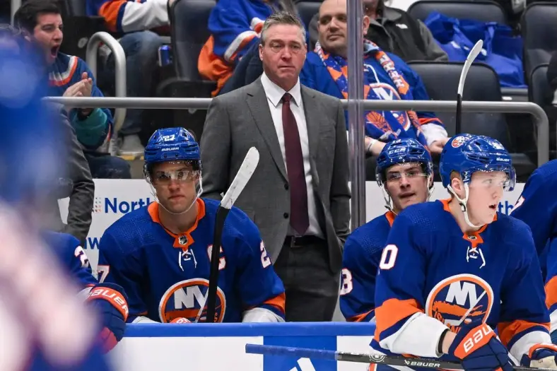 Feb 8, 2024; Elmont, New York, USA; New York Islanders head coach Patrick Roy coaches against the Tampa Bay Lightning during the third period at UBS Arena. Mandatory Credit: Dennis Schneidler-USA TODAY Sports