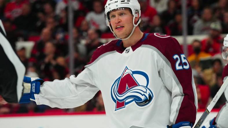 Feb 8, 2024; Raleigh, North Carolina, USA; Colorado Avalanche right wing Logan O'Connor (25) reacts against the Carolina Hurricanes during the third period at PNC Arena. Mandatory Credit: James Guillory-USA TODAY Sports