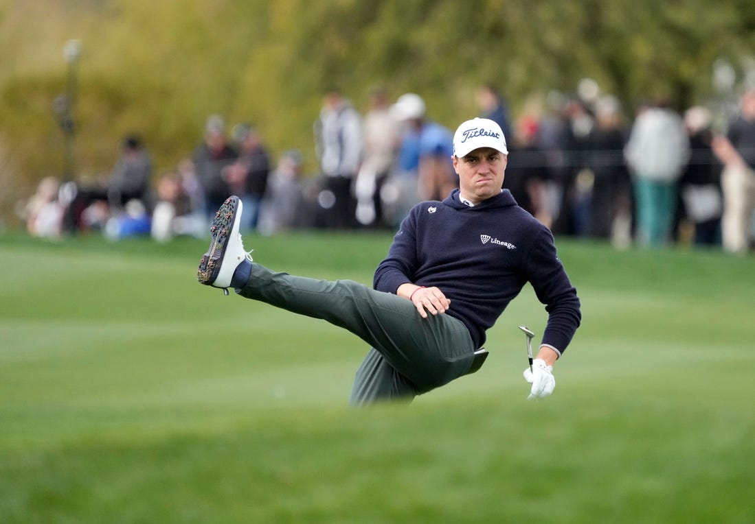 Justin Thomas reacts after his pitch onto the 15th green during round 2 of the WM Phoenix Open at TPC Scottsdale on Feb. 8, 2024.