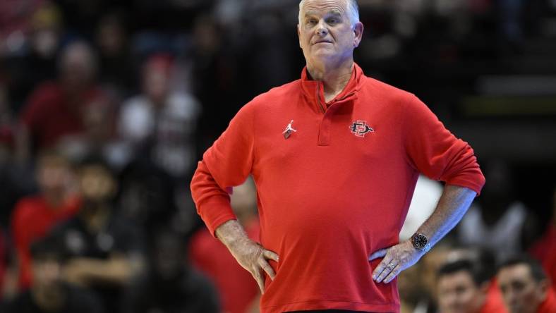 Feb 13, 2024; San Diego, California, USA; San Diego State Aztecs head coach Brian Dutcher looks on during the first half against the Colorado State Rams at Viejas Arena. Mandatory Credit: Orlando Ramirez-USA TODAY Sports