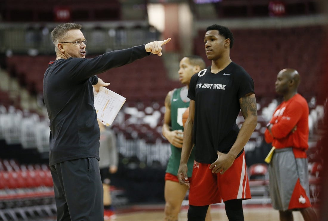Ohio State Buckeyes guard C.J. Jackson listens to direction from head coach Chris Holtmann during the shoot-around prior to their game later that evening against Penn State at Value City Arena in Columbus on Feb. 7, 2019. [Adam Cairns/Dispatch]
