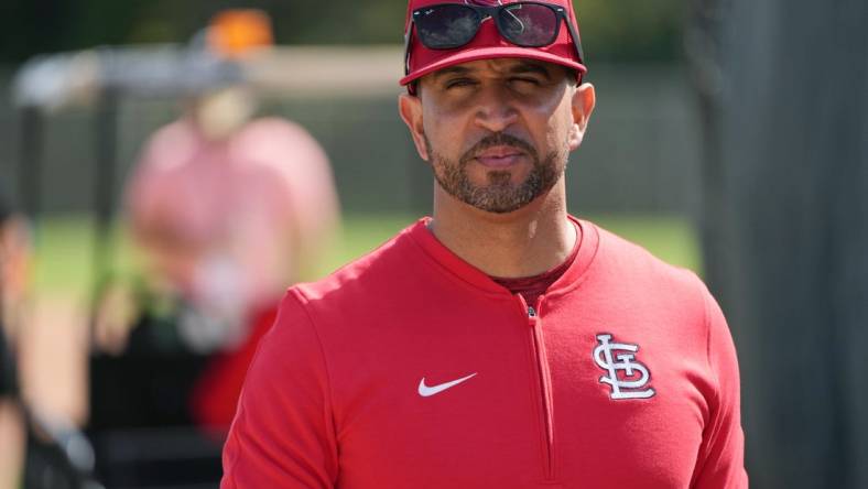 Feb 15, 2024; Jupiter, FL, USA;  St. Louis Cardinals manager Oliver Marmol (37) checks on his team during workouts at spring training. Mandatory Credit: Jim Rassol-USA TODAY Sports