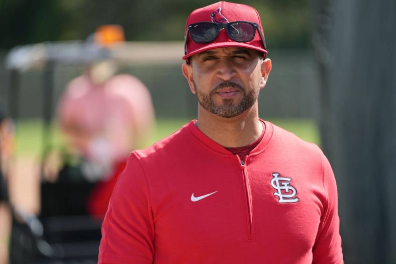 Feb 15, 2024; Jupiter, FL, USA;  St. Louis Cardinals manager Oliver Marmol (37) checks on his team during workouts at spring training. Mandatory Credit: Jim Rassol-USA TODAY Sports