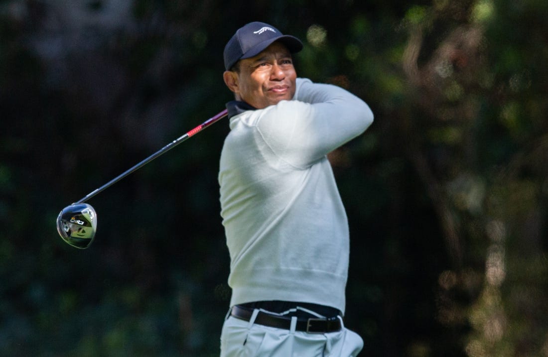 Feb 15, 2024; Pacific Palisades, California, USA; Tiger Woods on the twelfth hole during the first round of The Genesis Invitational golf tournament. Mandatory Credit: Jason Parkhurst-USA TODAY Sports