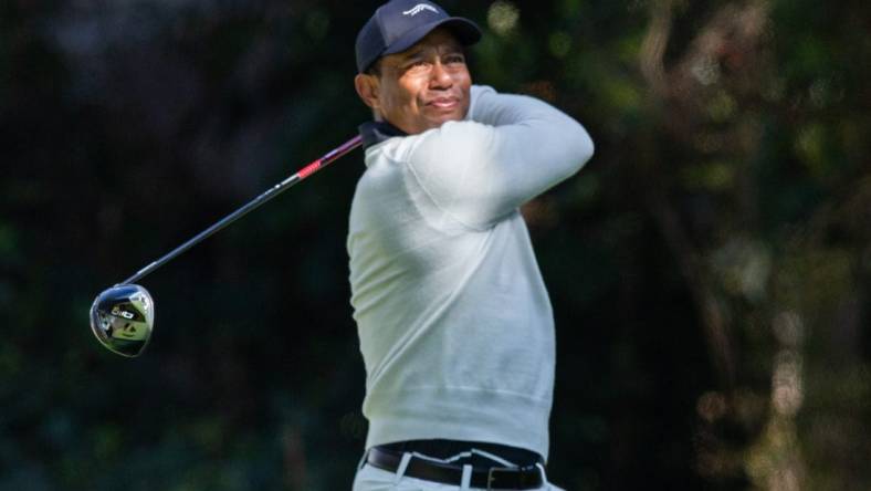 Feb 15, 2024; Pacific Palisades, California, USA; Tiger Woods on the twelfth hole during the first round of The Genesis Invitational golf tournament. Mandatory Credit: Jason Parkhurst-USA TODAY Sports