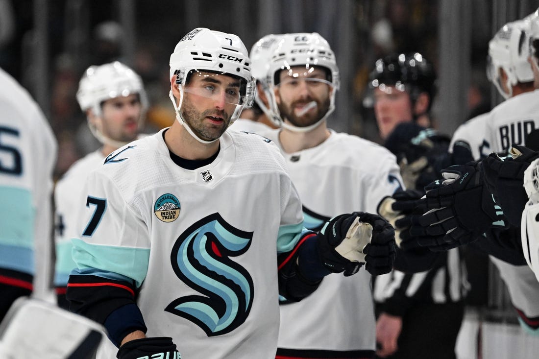 Feb 15, 2024; Boston, Massachusetts, USA; Seattle Kraken right wing Jordan Eberle (7) celebrates with his teammates after scoring a goal against the Boston Bruins during the first period at TD Garden. Mandatory Credit: Brian Fluharty-USA TODAY Sports