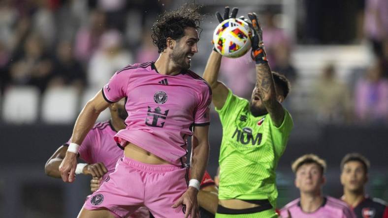 Feb 15, 2024; Fort Lauderdale, FL, USA; Inter Miami CF forward Leonardo Campana (8) attempts to connect a header against Newell   s Old Boys goalkeeper Lucas Hoyos (1) during the second half at DRV PNK Stadium. Mandatory Credit: Sam Navarro-USA TODAY Sports