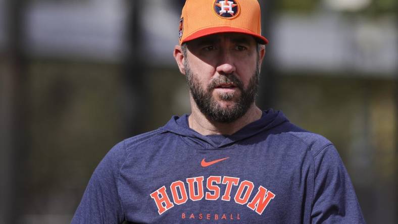 Feb 16, 2024; West Palm Beach, FL, USA; Houston Astros starting pitcher Justin Verlander (35) looks on during spring training practice at CACTI Park of the Palm Beaches. Mandatory Credit: Sam Navarro-USA TODAY Sports